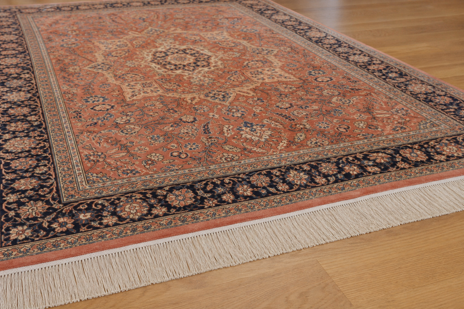 A restored rug with neat, even, fully intact fringe along the end